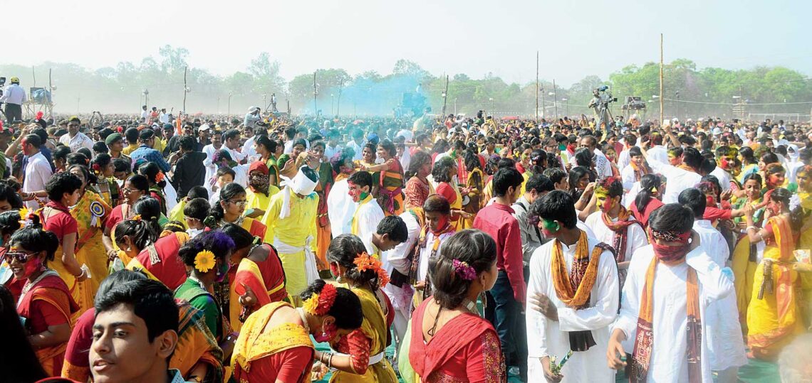 Visitors playing dol at Visva Bharati